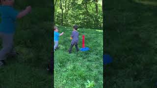 Boy hits baseball from batting tee and accidentally hit little brother on his face with his bat