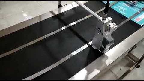 Thermal Ink Jet Printer with Stacker Conveyor System