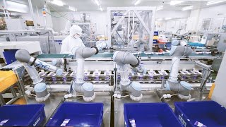 【ユニバーサルロボット】日本ゼトック株式会社（日本、医薬品等）の協働ロボット導入事例：商品の小箱入れ、段ボールの梱包