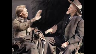 Buffalo Bill and Chief Iron Tail talking in sign language. (PISL)