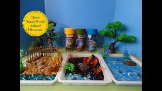 Three Small World Animal Dioramas - Wild Animals, Dinosaurs, & Ocean Animals