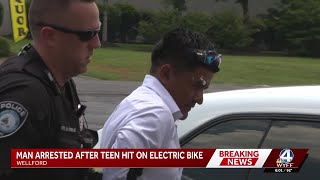 Man seen on video running from van after hitting child on E-bike is in custody, chief says