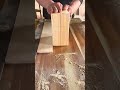 assembling a hollow rectangular wooden block structure precisely using clean hidden joints on wood