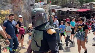 Boba Fett Walking Through Black Spire Outpost at Star Wars: Galaxy's Edge at Disneyland