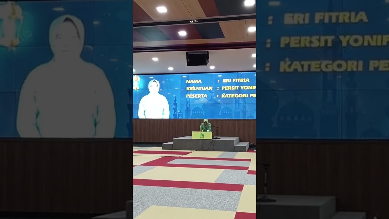 Qoriah Nasional Eri Fitria,S.Pd.I/Perwakilan Kodam XIV Hasanuddin PD MTQN TNI AD di MABESAD THN 2022