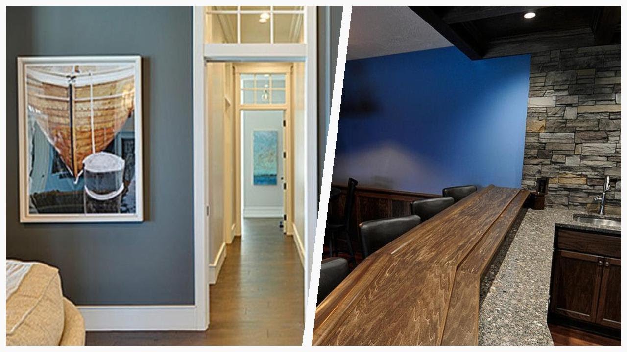 75 Basement With Blue Walls And A Stone Fireplace Design Ideas You'll ...