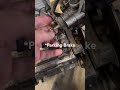 Rear Brake Job on a 2003 Suzuki LTZ400 ATV caliper piston compressed all the way to fit new pads