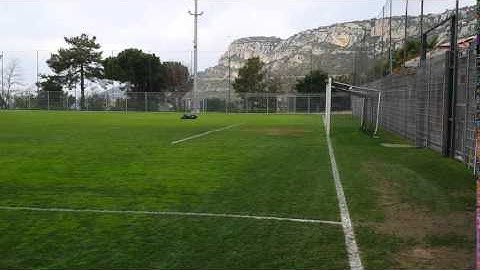 Robot mower in action ASM training grounds in La Turbie
