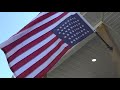 Americans display U.S. flag upside down in protest of Roe v. Wade decision  - YouTube