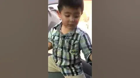 My 2 year old opening his little prize!