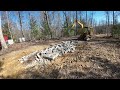 Smashing cinder blocks for a road base