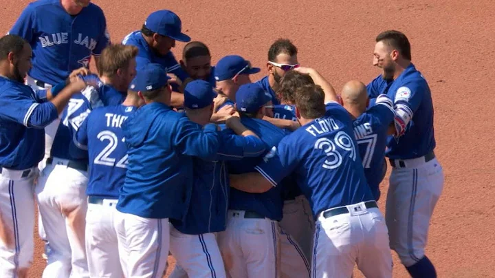 Blue Jays walk off on Travis' single in 9th