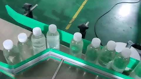 Thermal transfer coding system on automatic round bottle labeling machine, TTO printer