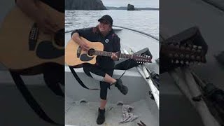 Whales Come Close to Boaters Singing and Playing Guitar || ViralHog