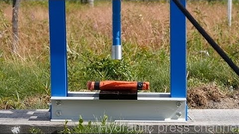 Crushing dynamite with hydraulic press