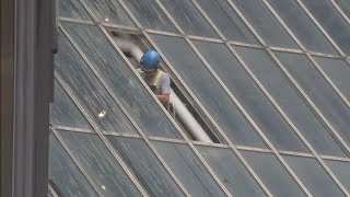 More glass falls from downtown Houston buildings after another storm moves through