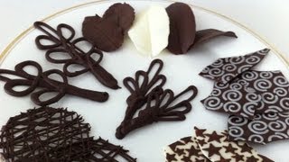 How to make chocolate decorations garnish your desserts. part 2 for
video on temper chocolate: http://youtu.be/s2apf1wsjds template piped
d...