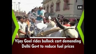 Vijay Goel rides bullock cart demanding Delhi Govt to reduce fuel prices  - #ANI News