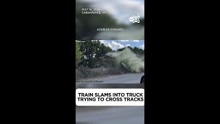 Train slams into truck trying to cross tracks