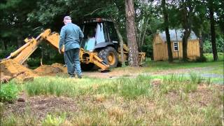 Case 580L Turbo digging the trench in HD