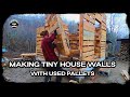 Building more walls out of pallet wood  part 2  tiny pallet house in the woods