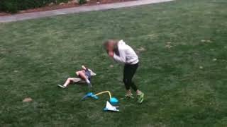 Girl steps on stomp rocket and hits little boy in the face