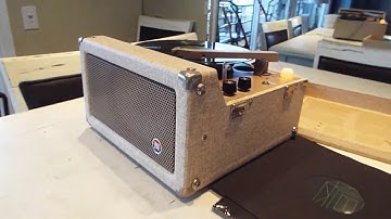 Newcomb 4 speed record player playing an LP, 12", 33.3 RPM record