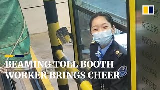 Beaming Toll Booth Worker In China Warm The Hearts Of Many Online
