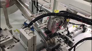 Fully auto clothes hanger hook inserting assembly machine