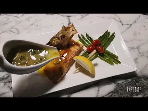Grilled Salmon Steak at Compass Skyview Hotel | Easy Trip