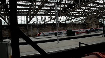 Virgin Rail Train Arriving At Glasgow Central Station