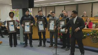Aurora police officers honored for rescuing boy, woman from frozen pond