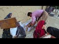 Nowruz teacher and family helping mirza in building a house