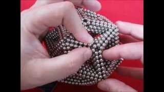 20-gon rhombic triacontahedron
The triacontahedron made with 20-gons with corners looking like flowers can be completed by adding some dots in the corners to look like a puffy triacontahedron, as can be seen also in this video. 20-gon rhombic triacontahedron