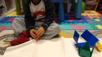 J playing with Learning Resources