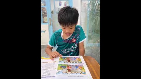 Tiếng Anh Giao Tiếp Phan Thiết: Tom practices describing difference between 2 pictures