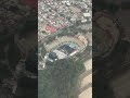 Yandel ve el estadio de Guatemala desde el avión