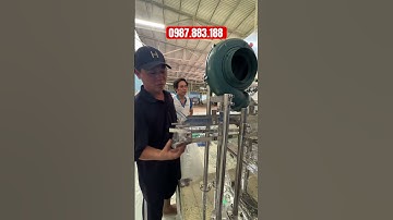 Máy chiết rót nước vào chai và đóng nắp tự động