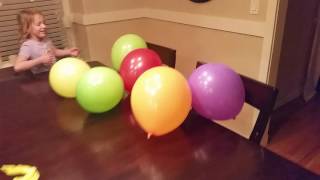 Eva popping My 47th Birthday Ballons