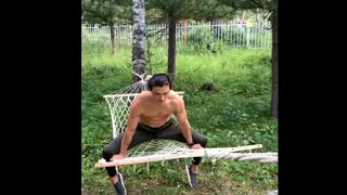 Professional Performer Balances Planche On A Hammock But Faces Landing Issues