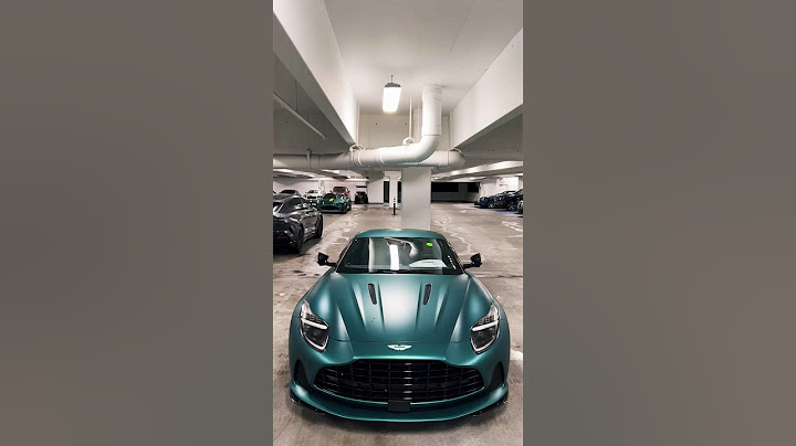 This is the new Aston Martin DB12 coupe in Aston Martin Racing Green.