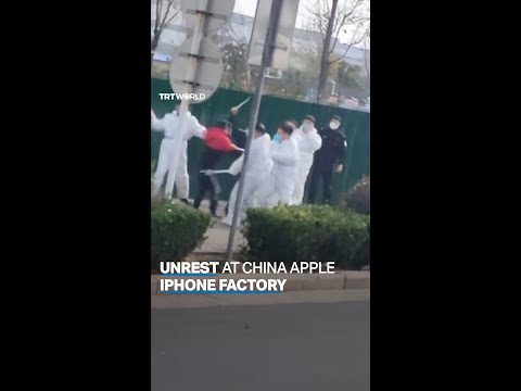 China Apple factory workers clash with security personnel