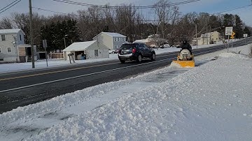 cub cadet power!  3205 model plowing snow.