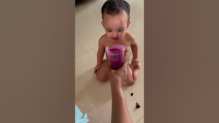 little Baby trying Java plum juice (jam) for the first time.