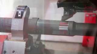 Single-Turret CNC machine /  Zwei Revolver Maschine mit Robot Be-Entladung