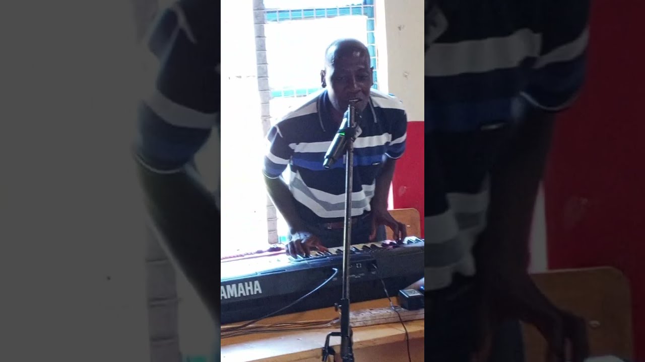 Charles Githinji performing gospel music 