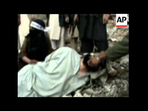 Afghanistan - Militant Video Shows Boy Beheading Alleged Taliban Traitor