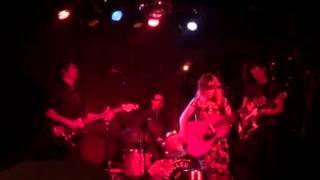 Little Lonely performing "Top Stair" at The Howling Rooster Show at Three Clubs