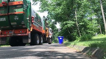 Peterbilt 520 Labrie Automizer Split Body Collecting Trash and Recycling on a Humid Summer Afternoon