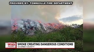 Smoke from large mulch fire causing issues in Oconee County